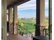 View from the covered patio to backyard featuring golf course views and outdoor entertaining space at 16491 Fairway Dr, Commerce City, CO 80022