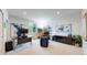 Bright home office with a modern desk, comfortable seating, and contemporary decor at 16491 Fairway Dr, Commerce City, CO 80022