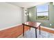 Bright dining room with a table, hardwood floors, natural light, and a clean, versatile space at 1301 Speer Blvd # 702, Denver, CO 80204