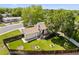 Aerial view of a home in a quiet neighborhood with mature trees at 11199 Dahlia Pl, Thornton, CO 80233