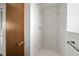 Updated bathroom featuring a new tile shower, and updated fixtures at 11199 Dahlia Pl, Thornton, CO 80233