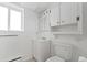 Bathroom featuring a clean white sink and toilet at 11199 Dahlia Pl, Thornton, CO 80233