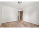 Neutral bedroom with an open door and standard ceiling fixture at 11199 Dahlia Pl, Thornton, CO 80233