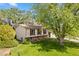 Charming two-story home with a well-maintained lawn and mature trees at 11199 Dahlia Pl, Thornton, CO 80233