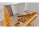 Upstairs view of the entryway and stairway, with neutral flooring, a front door, and coat closet at 11199 Dahlia Pl, Thornton, CO 80233