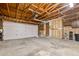 Clean garage space with overhead door and convenient interior access at 11199 Dahlia Pl, Thornton, CO 80233