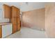 View of the kitchen area with linoleum floors and oak cabinets at 11199 Dahlia Pl, Thornton, CO 80233