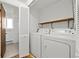 Bright laundry room with a washer and dryer at 11199 Dahlia Pl, Thornton, CO 80233