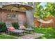 Charming backyard with patio furniture and a relaxing hammock at 2604 Elm St, Denver, CO 80207