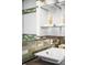 Well-appointed bathroom with a sleek vanity, modern fixtures, and unique decor, providing a comfortable and stylish retreat at 2604 Elm St, Denver, CO 80207