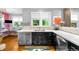 Bright kitchen featuring ample counter space, modern appliances, and natural light, perfect for cooking and entertaining at 2604 Elm St, Denver, CO 80207