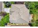 Aerial view of a home's roof and backyard, showcasing the layout and surrounding greenery at 3411 Springbriar Dr, Castle Rock, CO 80109