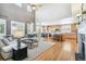 Open concept living room, kitchen and dining area, perfect for entertaining at 3411 Springbriar Dr, Castle Rock, CO 80109