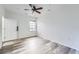 Simple bedroom with ceiling fan and wood floor at 16312 E Fremont Ave # 2, Aurora, CO 80016