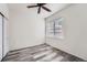 Bright bedroom with wood floor and window at 16312 E Fremont Ave # 2, Aurora, CO 80016