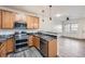Modern kitchen with stainless steel appliances and granite countertops at 16312 E Fremont Ave # 2, Aurora, CO 80016