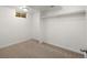 Finished basement with closet space and small window at 10415 Owens Cir, Broomfield, CO 80021