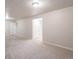 Finished basement with neutral walls and flooring at 10415 Owens Cir, Broomfield, CO 80021