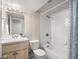 Bathroom featuring a tub and shower combination with modern fixtures at 10415 Owens Cir, Broomfield, CO 80021