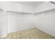 Bright, walk-in closet with carpet and shelving at 10415 Owens Cir, Broomfield, CO 80021