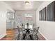 Bright dining area featuring modern furnishings and stylish decor adjacent to the kitchen at 10415 Owens Cir, Broomfield, CO 80021