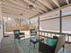 Covered patio with outdoor seating and patterned rug at 10415 Owens Cir, Broomfield, CO 80021
