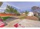Large backyard featuring mature trees and storage shed at 4940 Adams St, Denver, CO 80216