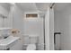 Basement bathroom includes sink and commode at 4940 Adams St, Denver, CO 80216