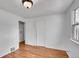 Cozy bedroom features wood floors and a large closet at 4940 Adams St, Denver, CO 80216