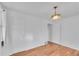 This bedroom includes wood floors and walk-in closet at 4940 Adams St, Denver, CO 80216