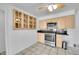 Practical kitchen featuring stainless steel appliances, granite countertops, and ample storage at 4940 Adams St, Denver, CO 80216