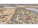 Overhead view of a suburban townhome community located conveniently between multiple lakes at 11250 Florence St # 21A, Commerce City, CO 80640