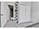 Hallway with storage featuring closet and shoe rack at 11250 Florence St # 21A, Commerce City, CO 80640