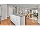 Open floor plan combining kitchen, dining, and living areas for seamless entertaining at 11250 Florence St # 21A, Commerce City, CO 80640