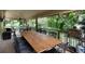 Outdoor dining area on deck with space to entertain, featuring a BBQ and patio heater at 2480 W Jamison Way, Littleton, CO 80120