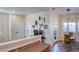 A cozy breakfast nook area with lots of natural light and wood floors at 13708 Legend Trl # 101, Broomfield, CO 80023
