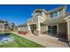 Attractive home exterior with stylish siding, stone accents, and well-maintained landscaping at 13708 Legend Trl # 101, Broomfield, CO 80023