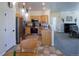 Updated kitchen overlooking the living room at 13708 Legend Trl # 101, Broomfield, CO 80023
