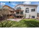 Two-story home with a balcony, patio, well-maintained lawn and attractive landscaping at 9195 Anasazi Indian Trl, Highlands Ranch, CO 80129