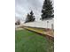 Spacious backyard featuring low maintenance turf and a well-kept privacy fence for outdoor enjoyment at 1137 S Coolidge Cir, Aurora, CO 80018