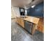 Open concept kitchen featuring island with stainless steel dishwasher and sink at 1137 S Coolidge Cir, Aurora, CO 80018