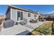 Well-maintained backyard with a patio area perfect for outdoor dining and entertainment at 7426 Blue Water Ln, Castle Rock, CO 80108