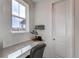 Bright office nook featuring a window and stone desktop complemented by neutral tones and minimalist décor at 17046 Desert Wine Trl, Parker, CO 80134