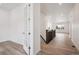Bright entryway leads to spacious living areas with light wood floors at 9197 Ironwood St, Highlands Ranch, CO 80129