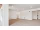 Spacious living room with bright natural light and neutral carpeting at 9197 Ironwood St, Highlands Ranch, CO 80129