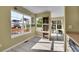 Eat-in kitchen filled with sunlight featuring an open design and hardwood floors at 5660 S Algonquian Way # A, Aurora, CO 80016