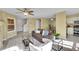Comfortable living room with a cozy couch, neutral paint, open layout and lots of light at 5660 S Algonquian Way # A, Aurora, CO 80016