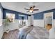 Spacious main bedroom with a ceiling fan and hardwood floors at 5660 S Algonquian Way # A, Aurora, CO 80016