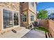 A patio features concrete, a wooden fence, and an air conditioner at 5660 S Algonquian Way # A, Aurora, CO 80016