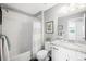 Clean bathroom with a shower/tub combo and granite countertop at 5245 W 97Th Ave, Broomfield, CO 80020